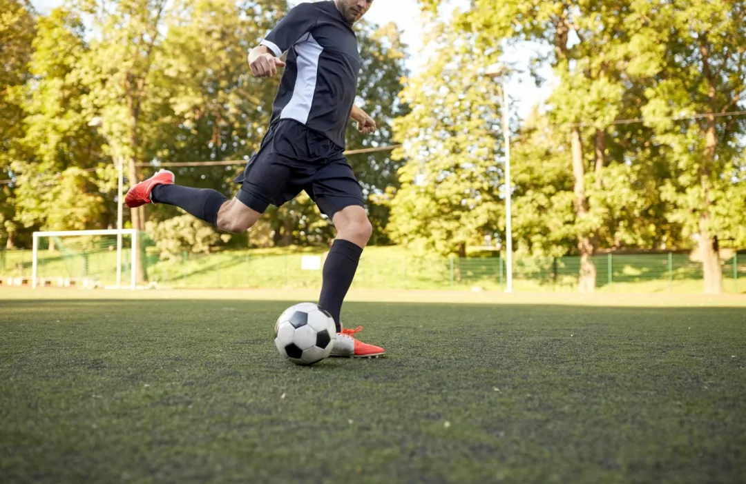 Soccer player on field — ankle sprains are common in pivoting sports