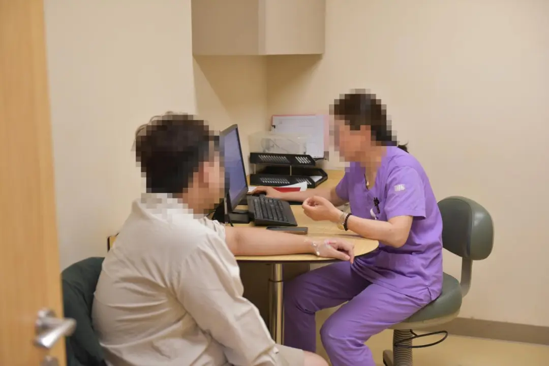 Edencare physician consulting with patient about integrated metabolic and thyroid care